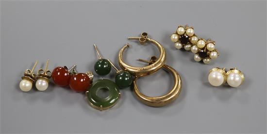 A pair of 9ct gold creole earrings, five other pairs of earrings and a jade pendant